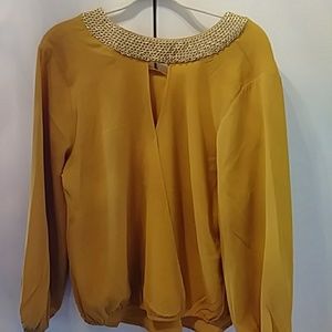 Gold colored blouse